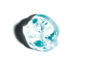 Cosmetic gel, serum swatch isolated on white background. transparent skincare product smear smudge . Liquid cream with texture