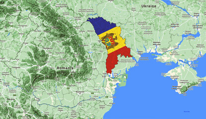 Moldova seen from satellites covered with the national flag.