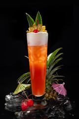 The Singapore Sling cocktail on black background. Tropical cocktail.
