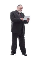 Mature businessman using a digital tablet . isolated on a white
