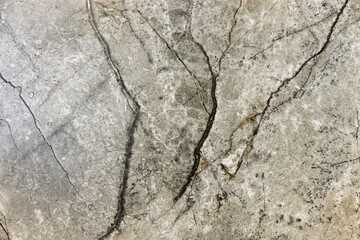 Stone rust texture or background with corrosion spots and deep crack