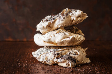 Meringue cake with chocolate and cherries