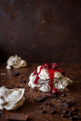 Meringue cake with chocolate and cherries