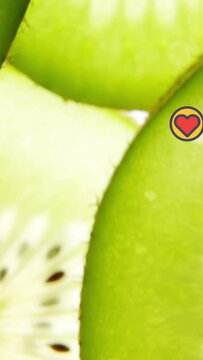Animation of heart icons over kiwi fruit