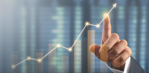 Hand touching  graphs of financial indicator market analysis chart