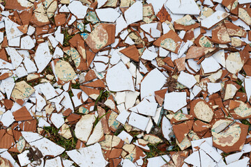 White and brown broken removed tiles