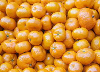 Fresh mini oranges or Tangerines are small and very sour.Popular in East Asia.