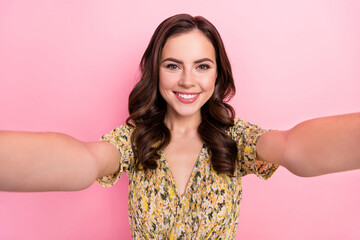 Photo of gorgeous friendly person make take selfie toothy smile isolated on pink color background
