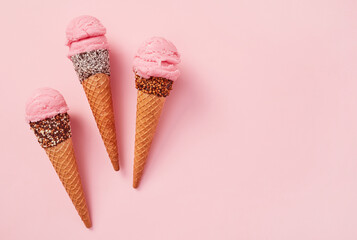 Ice cream cones on pink background