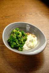 Poached egg with broccoli
