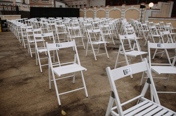 a row of chairs outside