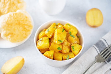 Curry potato with poori bread