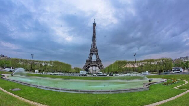 Eiffel Tower with central perspective with fountain timelapse hyperlapse.