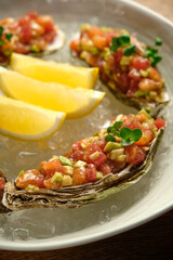 Beef tartar with salad and garlic toast on dark bread