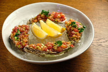 Beef tartar with salad and garlic toast on dark bread