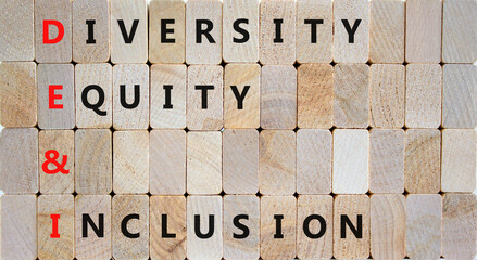 DEI, Diversity equity and inclusion symbol. Concept words DEI diversity equity and inclusion on wooden blocks on beautiful wooden background. Business DEI diversity equity and inclusion concept.