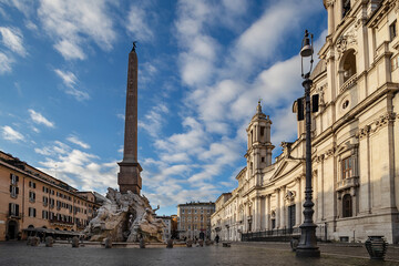 Fototapeta na wymiar Piazza Navona with The Fountain of Four Rivers (Fontana dei Quattro Fiumi) and Church of Saint Agnes. Rome, Italy.