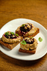 homemade meat pate on toasted crusty bread.