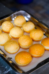 A round Japanese homemade doughnut or Bomboloni, sweet bakery fried with hot oil.