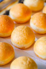 A round Japanese homemade doughnut or Bomboloni, sweet bakery fried with hot oil.