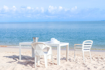 White tables by the sea, seaside cafes in Thailand