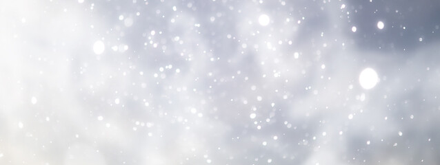 blue snowfall bokeh background, abstract snowflake background on blurred abstract blue