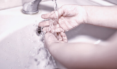 Hygiene rules. Hand washing before meals. Antibacterial treatment of hands with soap. A way to prevent virus infection. Coronavirus protection.