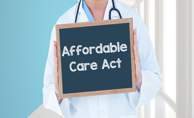 Affordable care act - Doctor shows information on blackboard.Doctor holding chalkboard with text.