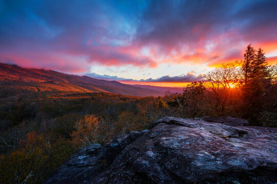 Scenic sunrise over an autumn landscape near Grandfather Mountain along the Blue Ridge Parkway in North Carolina