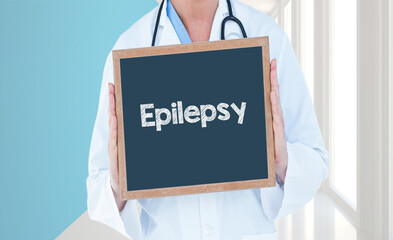 Epilepsy - Doctor shows information on blackboard.Doctor holding chalkboard with text.