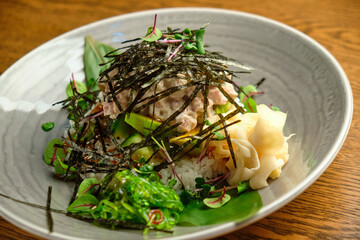 Trout flakes with avocado diced