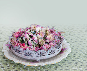 pink and purple dried flowers. Hortensia, rose flowers and herbs arrangement isolated on light...