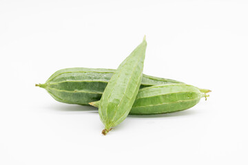 Fresh Angled loofah fruit isolated on white background,closeup