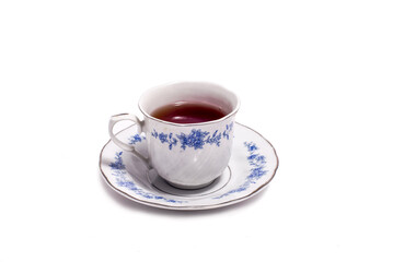 vintage tea cup and saucer isolated on white background