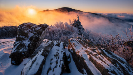 Scenic wintry landscape with colorful sky over the Appalachian Mountains from Roan Mountain State...