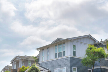 Low angle view of a house with shingles and board and batten sidings at La Jolla, California