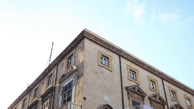 Looking Up at an Old Building near the Palermo Cathedral in Via Vittorio Emanuele, Historical Centre of Palermo, Sicily, Italy. 4K Resolution.