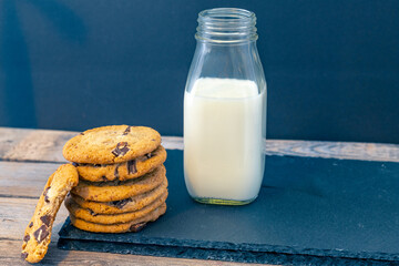 milk and cookies on table