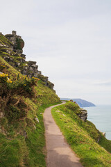 Fototapeta na wymiar Hiking trail high in the cliffs. The walkway offers beautiful ocean views