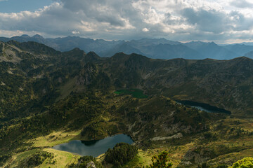 Naklejka na ściany i meble Dramatic light over the valley (Pyreness Mountains, Lakes of Rabassoles)