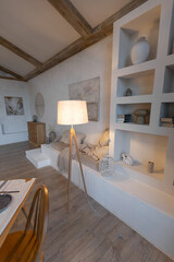 cozy warm home interior of a chic country house with an open plan, wood finishes, warm colors and a family hearth