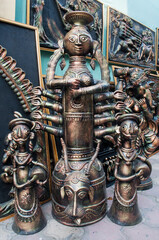 KOLKATA, WEST BENGAL , INDIA - DECEMBER 14TH 2013 : An handicraft artwork of Debi Durga, Hindu Goddess, with her daughters on display during the Handicraft Fair - the biggest handicrafts fair in Asia.