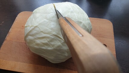 Knife cuts cabbage