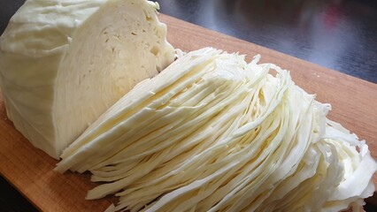 Shredded cabbage on a cutting board