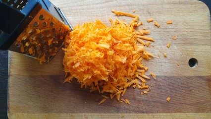 Grated carrots and grater