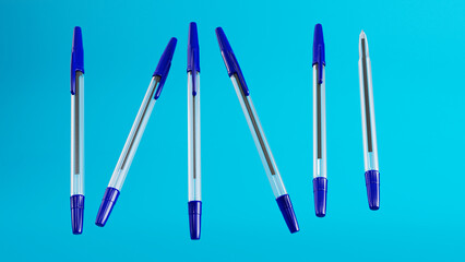 Pens collection isolated on blue background, 3D render