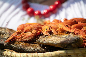 Boiled crayfish on a blurred light background.