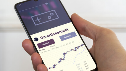 Investir dans un ETF divertissement. Diversifier son investissement s'exposer à un fonds etf thématique. Acheter un fonds en bourse. Spéculer sur la thématique. Texte en français.