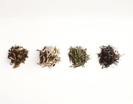Assorted loose tea on a white background