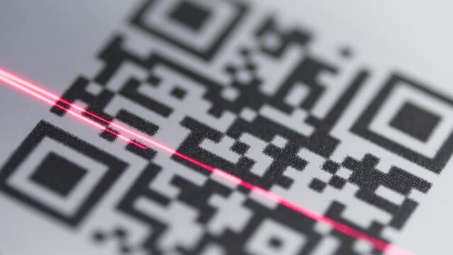 Red Laser Scanner Scanning a QR Code Closeup Shot
